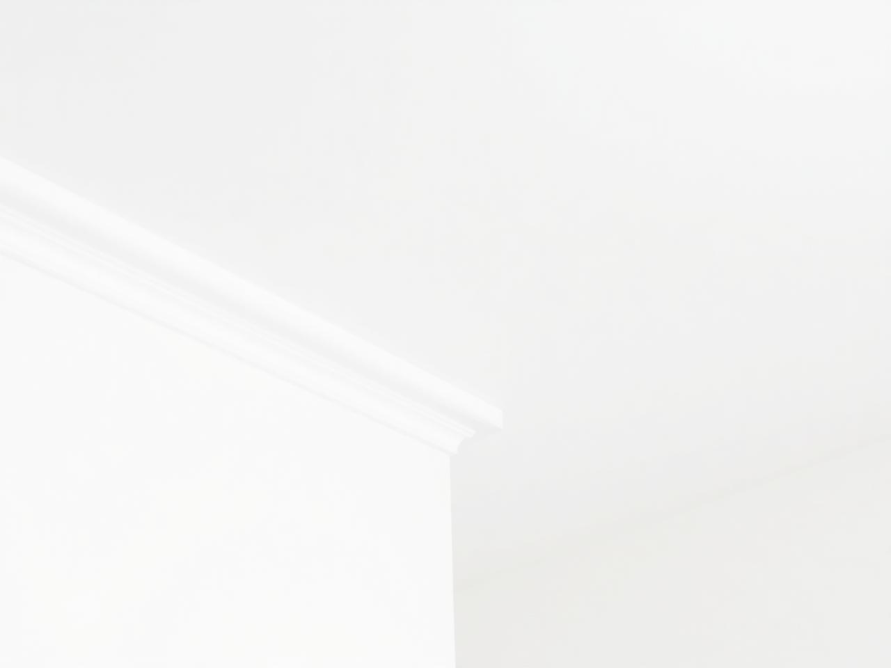 Smooth finished drywall corner showing clean professional finishing work